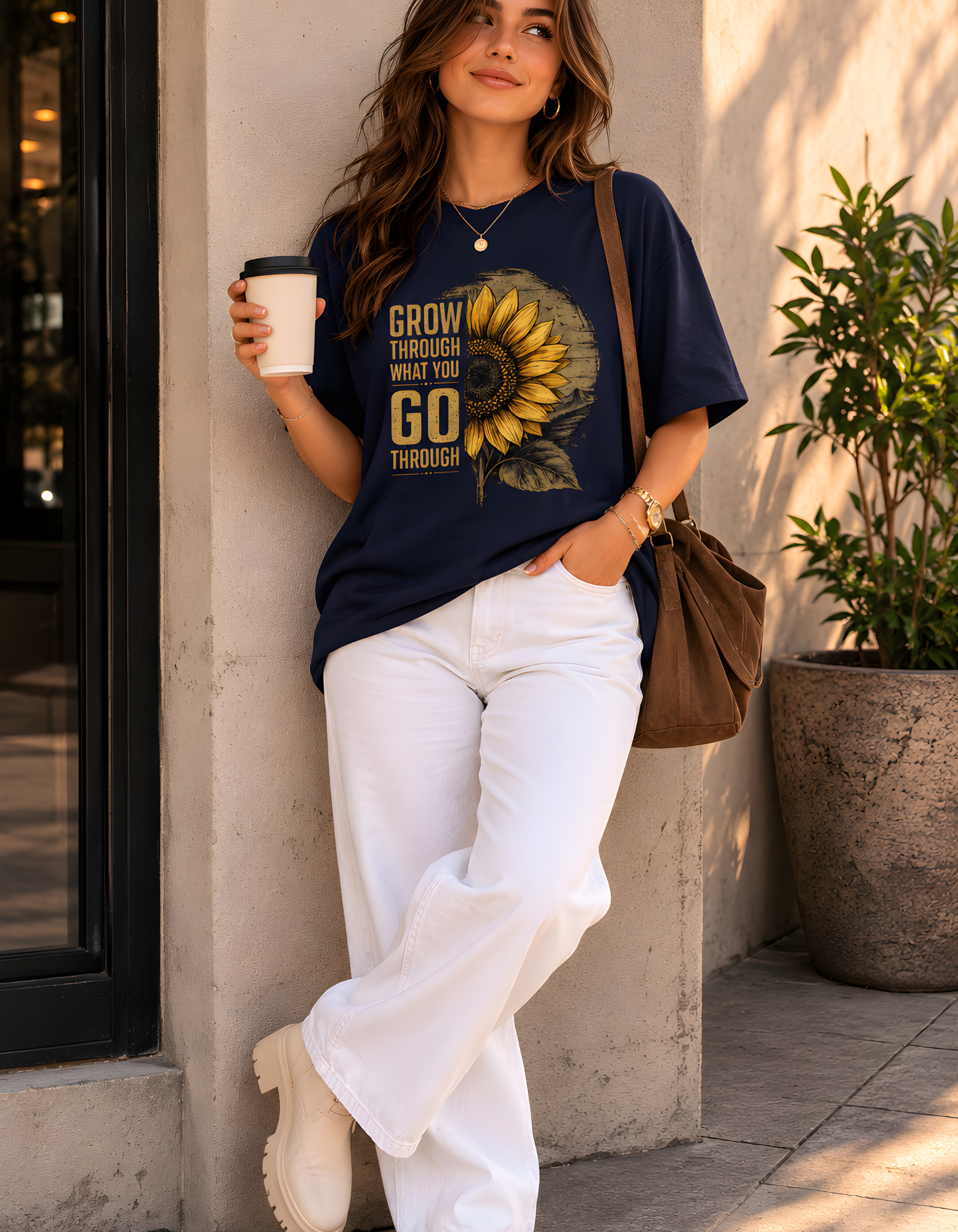 Trendy women's oversized sunflower t-shirt with motivational quote