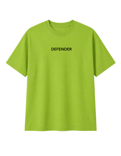 Athletic Indian male model wearing lime green Defender oversized t-shirt front view
