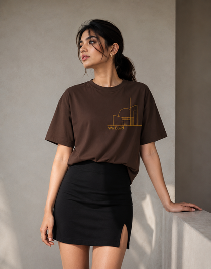 Luxury streetwear oversized brown graphic T-shirt on female model