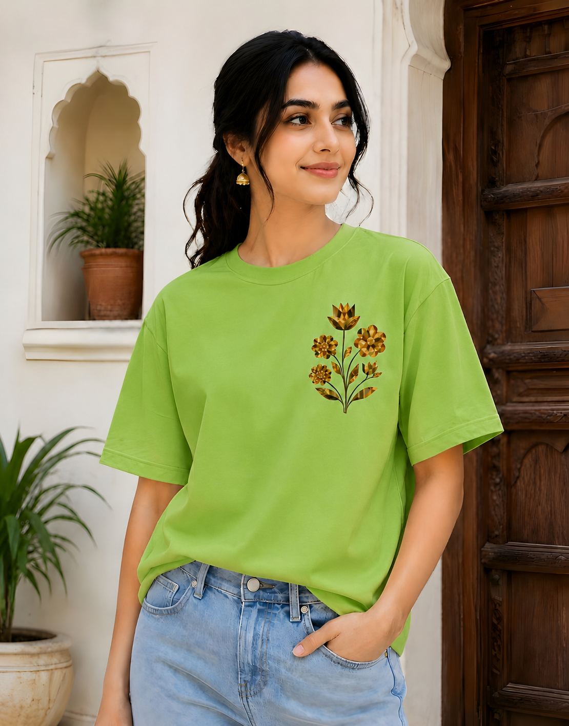 Indian female model wearing lime green oversized cotton graphic t-shirt