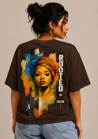 Women's oversized brown graphic t-shirt with artistic portrait design