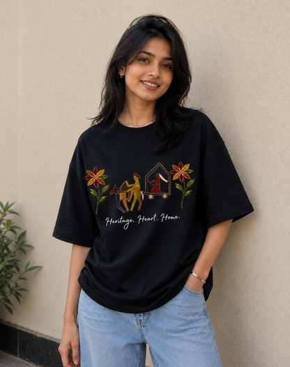 Women's black oversized t-shirt with Heritage Heart Home Punjabi graphic print